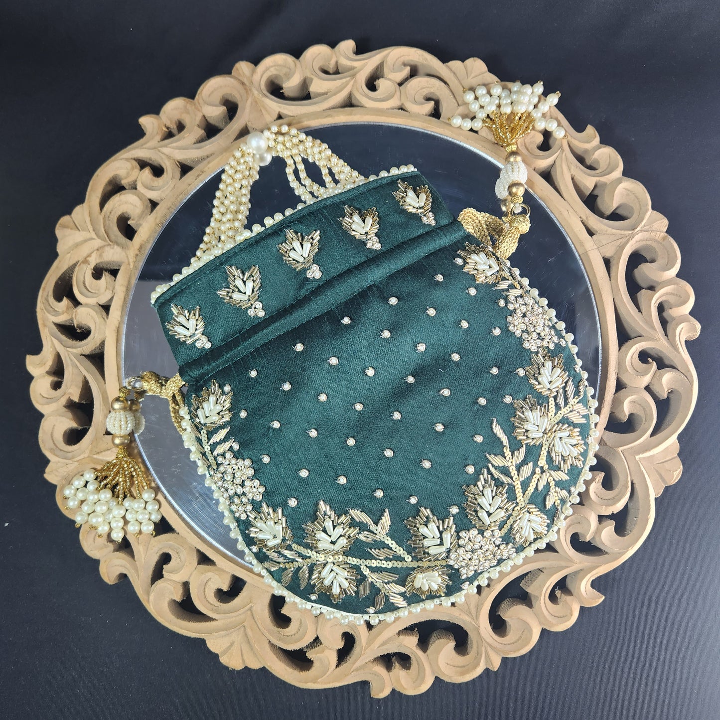 Jodha Bottle Green Potli