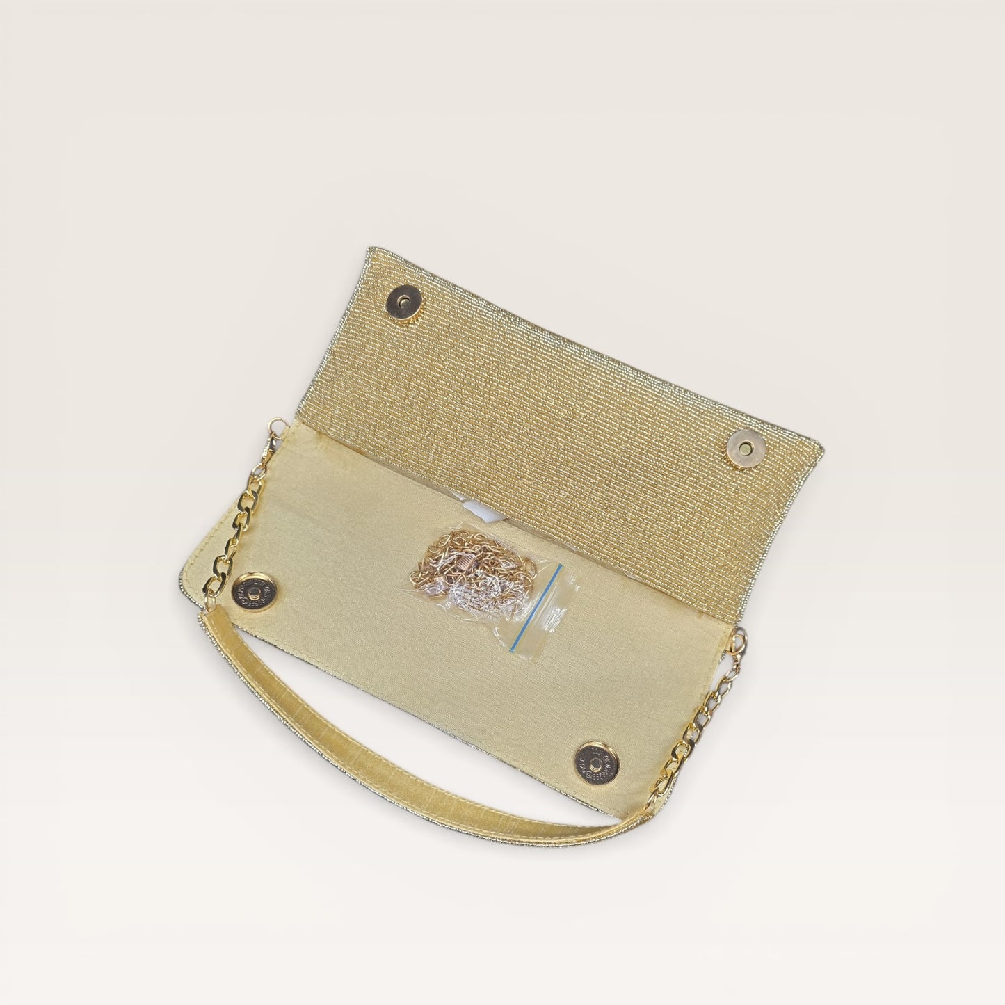 Hand-embroidered pastel bead envelope clutch with gold chain and Kardana work.