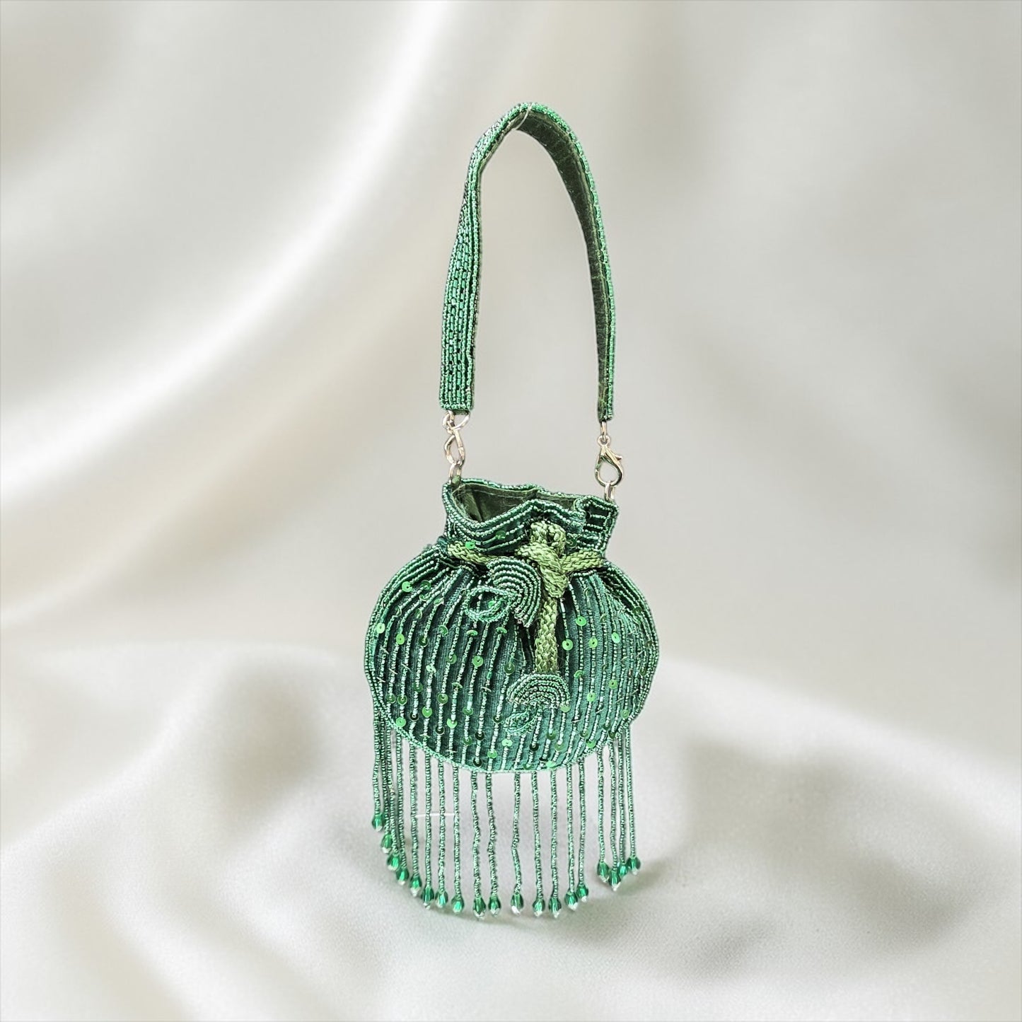 Mini velvet potli bag with seed beads and shimmering sequin hand embroidery