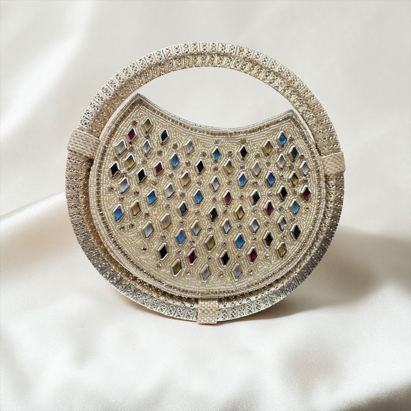 Circular jute handbag with colorful diamond stone embroidery and seed bead details.