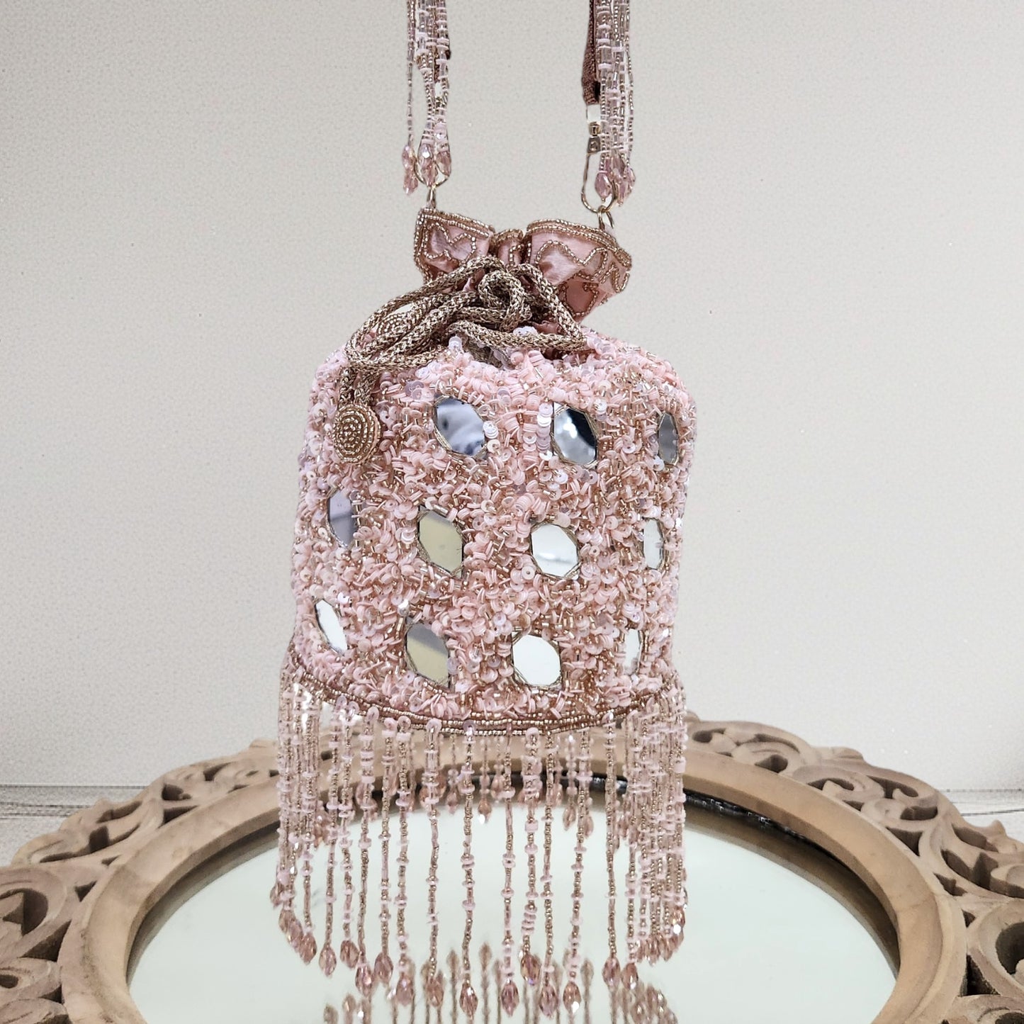 Jhalak Rose Gold Mirror Potli