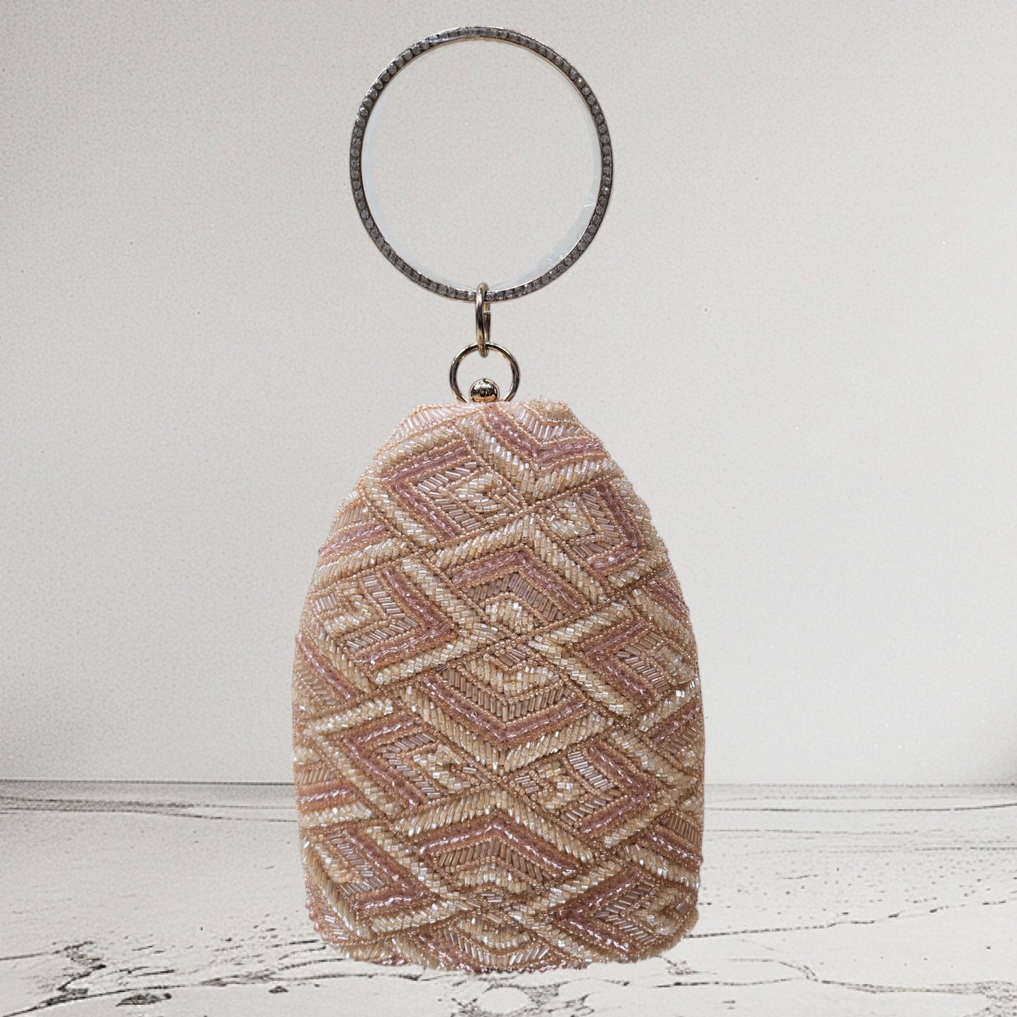 Ira Rose Gold Bottle Box Clutch