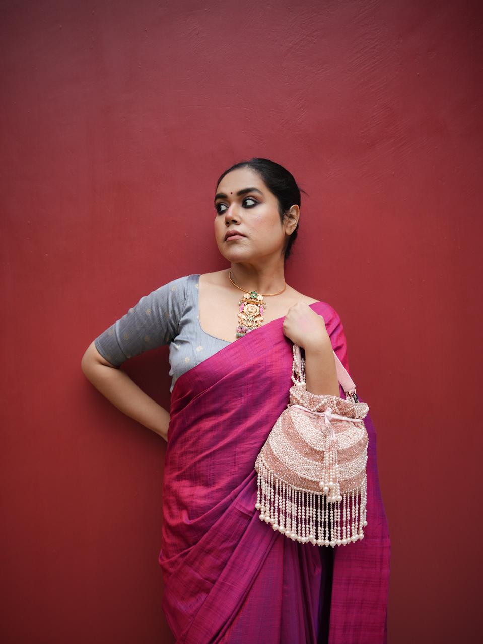 Moti Leher Gold Potli