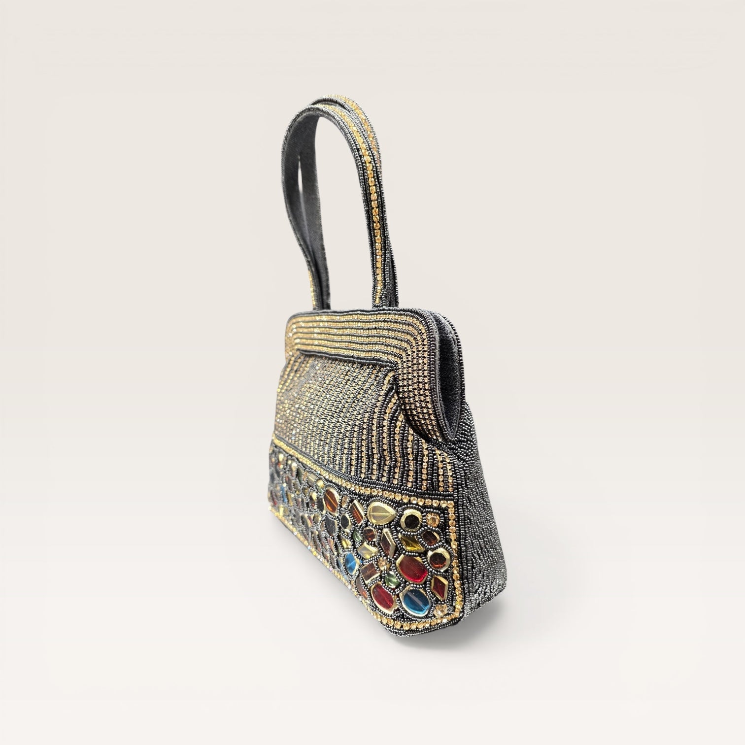 Hand-embroidered seed bead handbag with colorful stone border and twin embroidered handles.