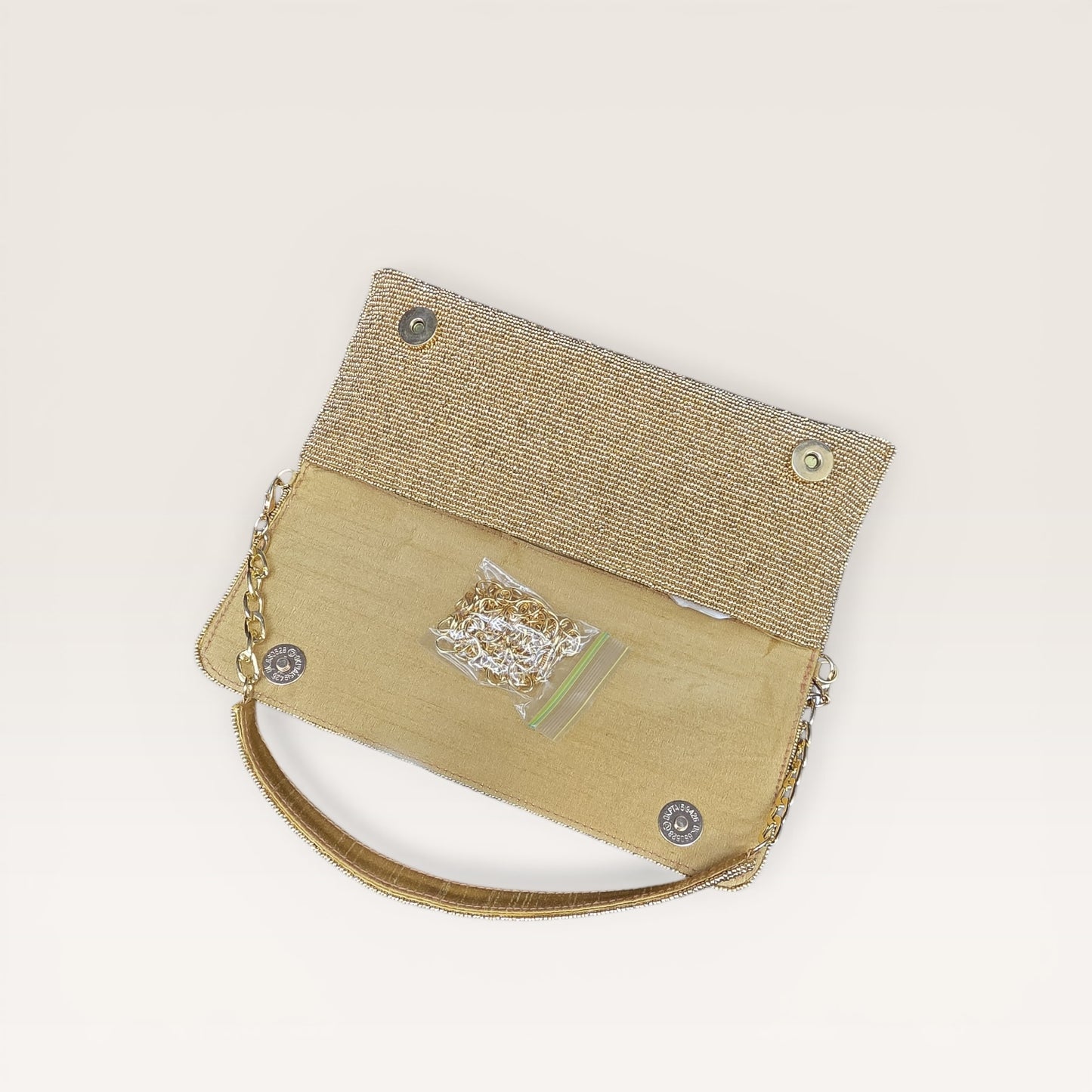Hand-embroidered pastel bead envelope clutch with gold chain and Kardana work.