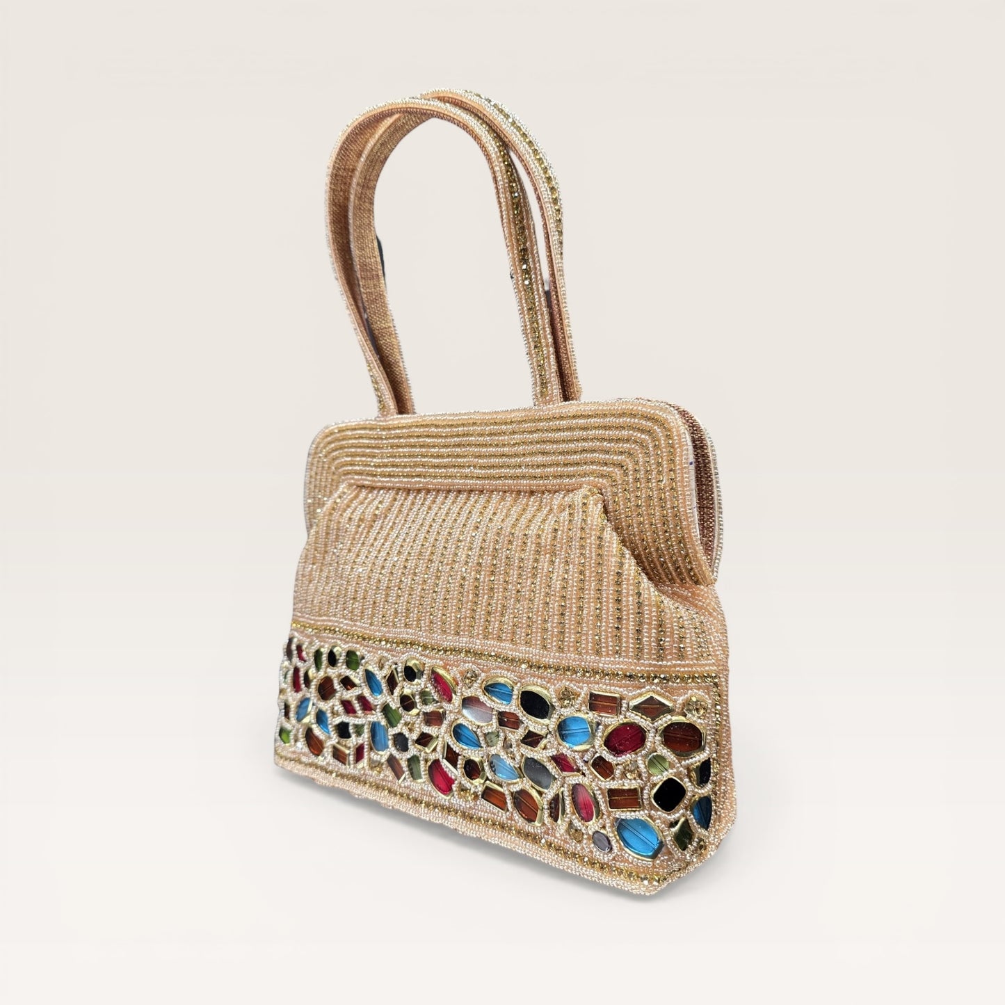 Hand-embroidered seed bead handbag with colorful stone border and twin embroidered handles.