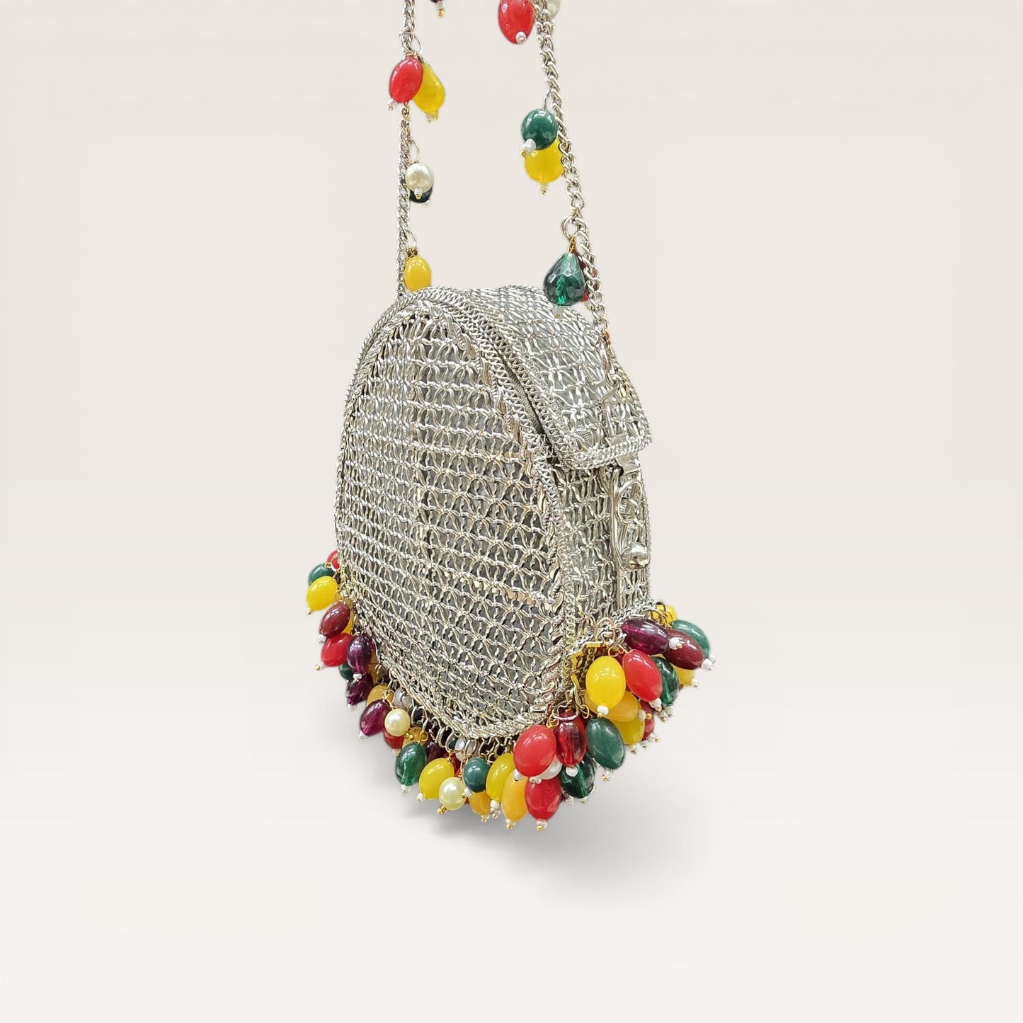 Brass metal party wear clutch with multi-color drop beads and chain handle for weddings.