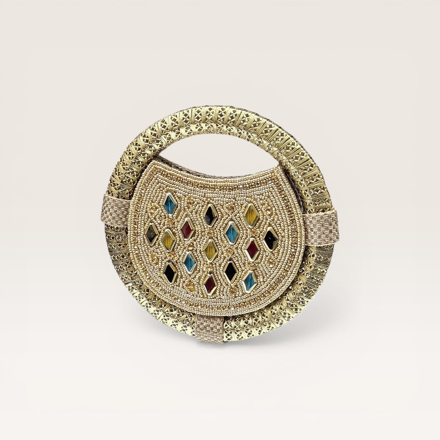 Discover our handcrafted nano ring bag made from premium jute. Embellished with colorful stones and seed beads. Perfect for festive and bridal luxury wear.
