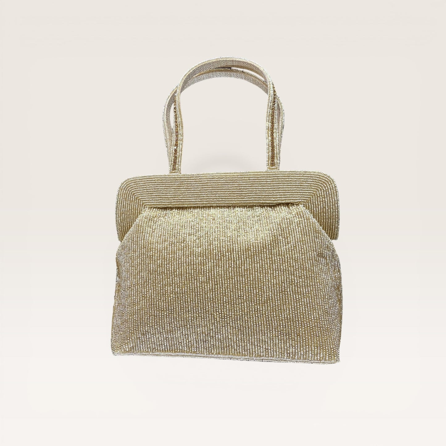Hand-embroidered seed bead handbag with colorful stone border and twin embroidered handles.