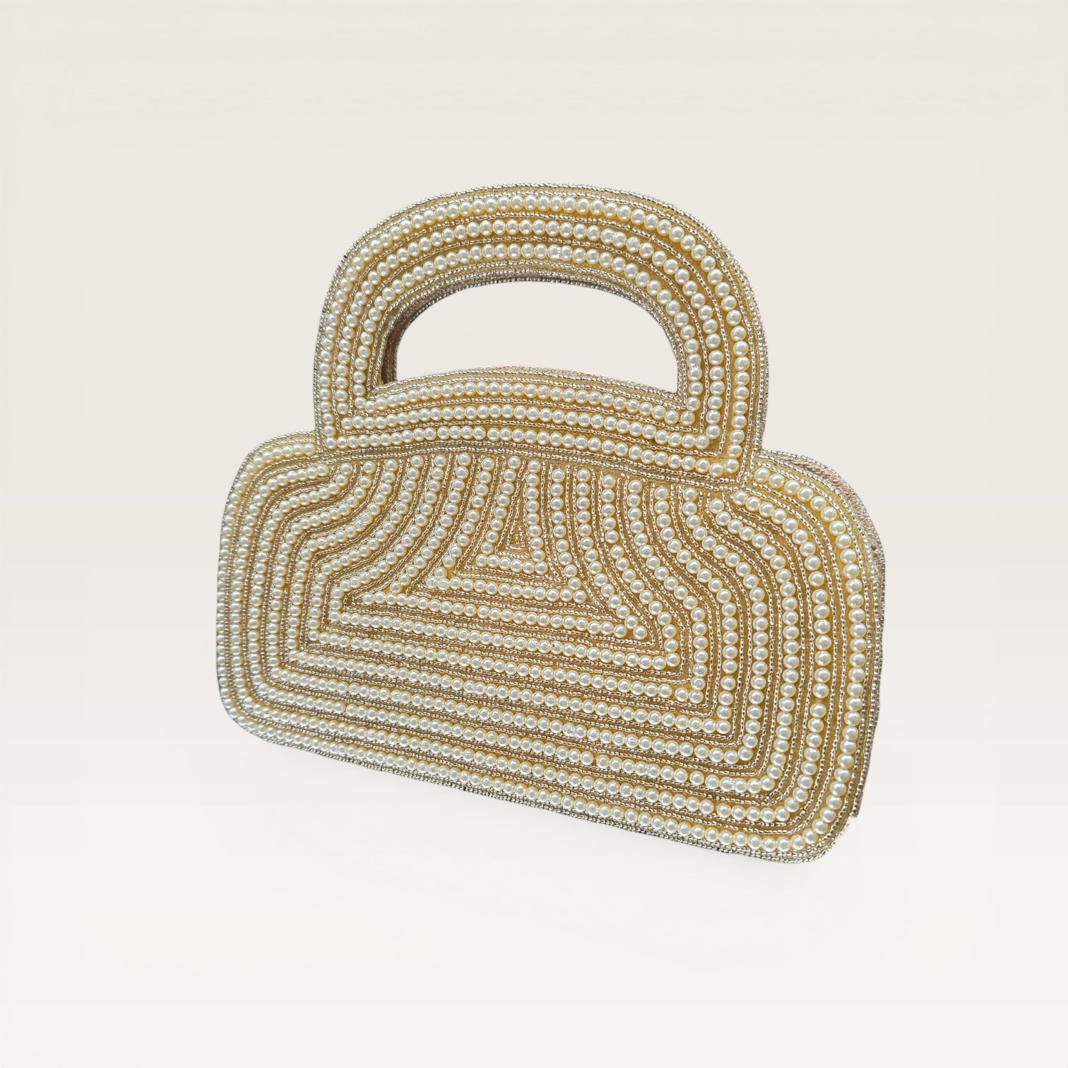 Dual-sided hand-embroidered luxury wedding bag featuring a central mother-of-pearl floral motif and a geometric pearl pattern on a natural jute base. This mini bucket-style bridal clutch includes a secure zip closure and an integrated hand-beaded handle, perfect for ethnic and festive wear