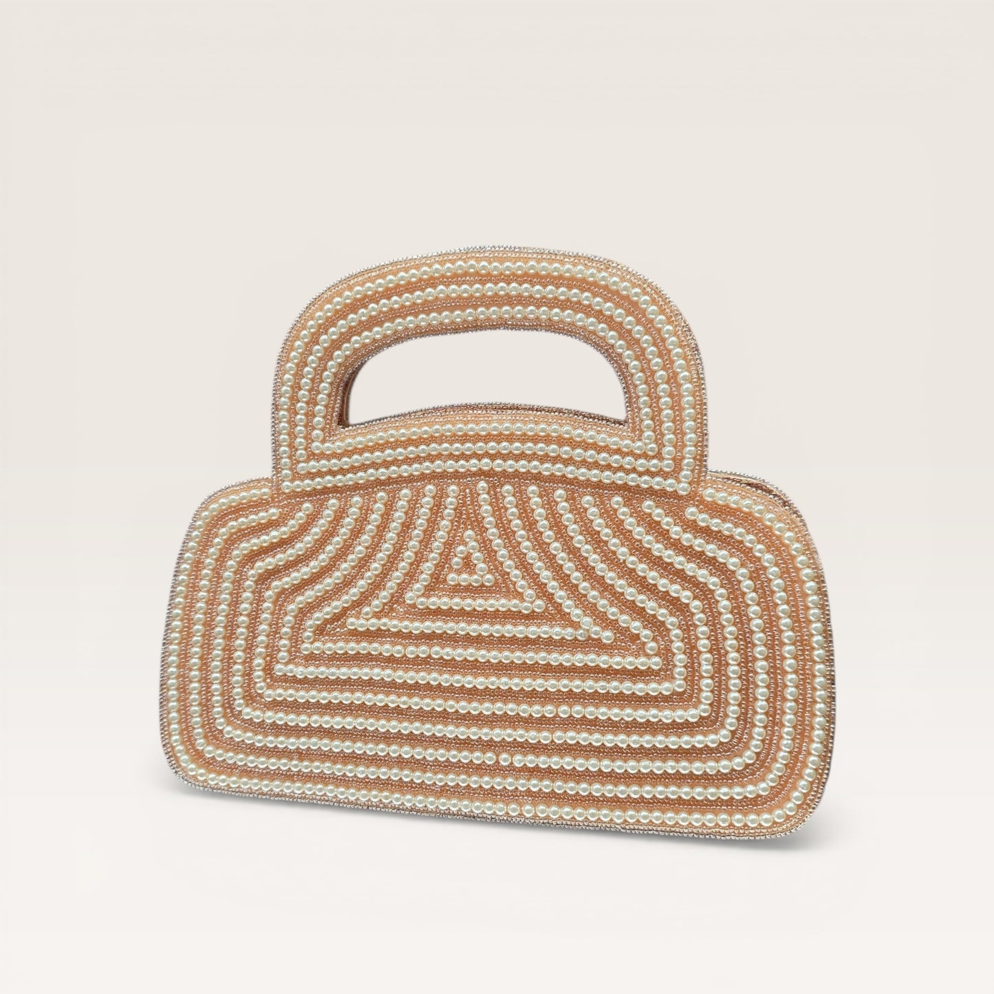 Dual-sided hand-embroidered luxury wedding bag featuring a central mother-of-pearl floral motif and a geometric pearl pattern on a natural jute base. This mini bucket-style bridal clutch includes a secure zip closure and an integrated hand-beaded handle, perfect for ethnic and festive wear