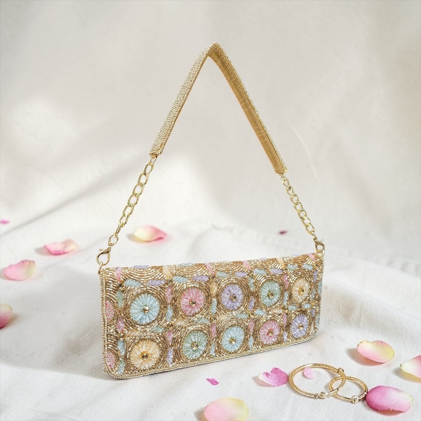 Hand-embroidered pastel bead envelope clutch with gold chain and Kardana work.