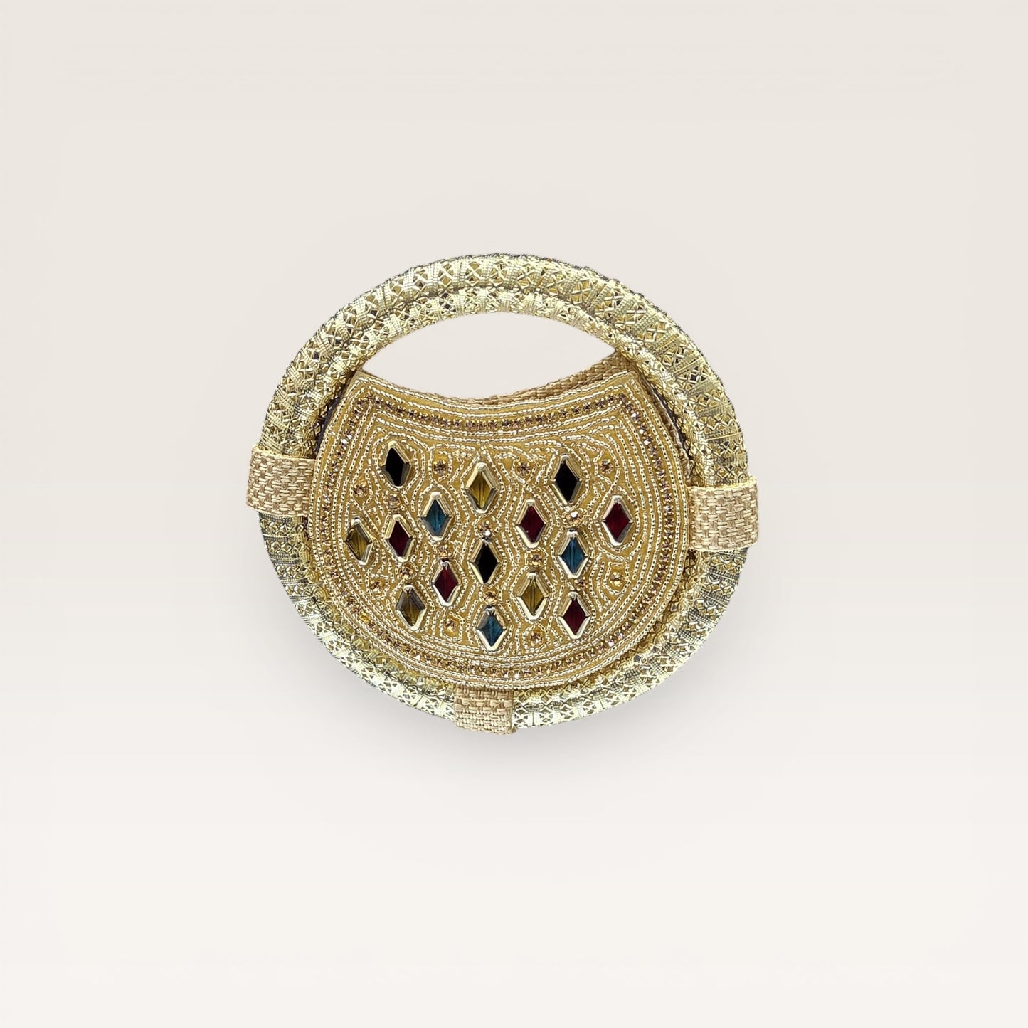 Discover our handcrafted nano ring bag made from premium jute. Embellished with colorful stones and seed beads. Perfect for festive and bridal luxury wear.