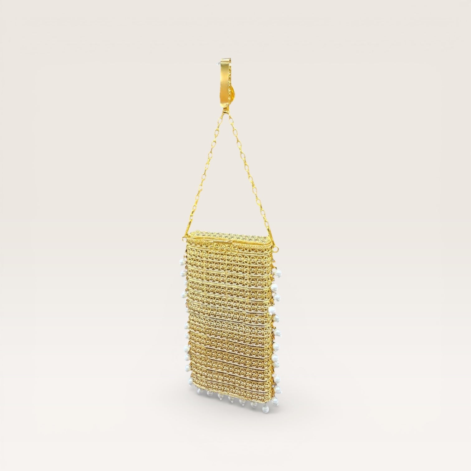 Gold brass mobile clutch with coloured teardrop stone and pearl tassels, luxury wedding phone bag
Designer brass phone clutch with pearl hangings and drop shaped stone detailing, ethnic party wear