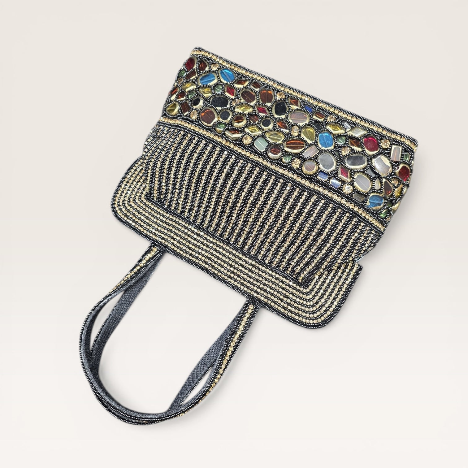 Hand-embroidered seed bead handbag with colorful stone border and twin embroidered handles.
