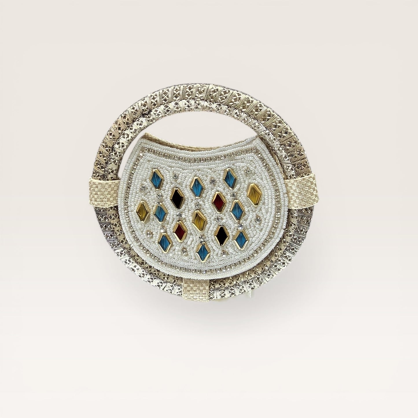 Discover our handcrafted nano ring bag made from premium jute. Embellished with colorful stones and seed beads. Perfect for festive and bridal luxury wear.