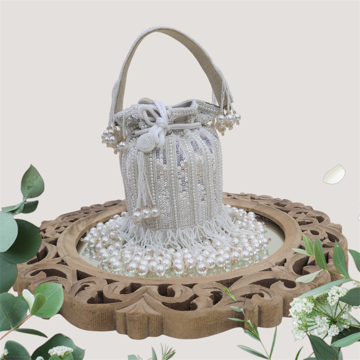 Jhilmil Sequin Ivory Potli