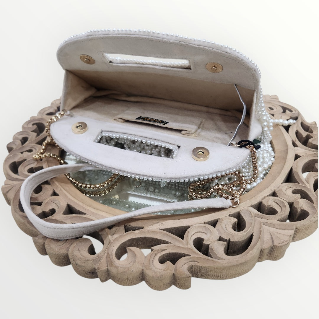 Chandrikaa Ivory Moti Clutch