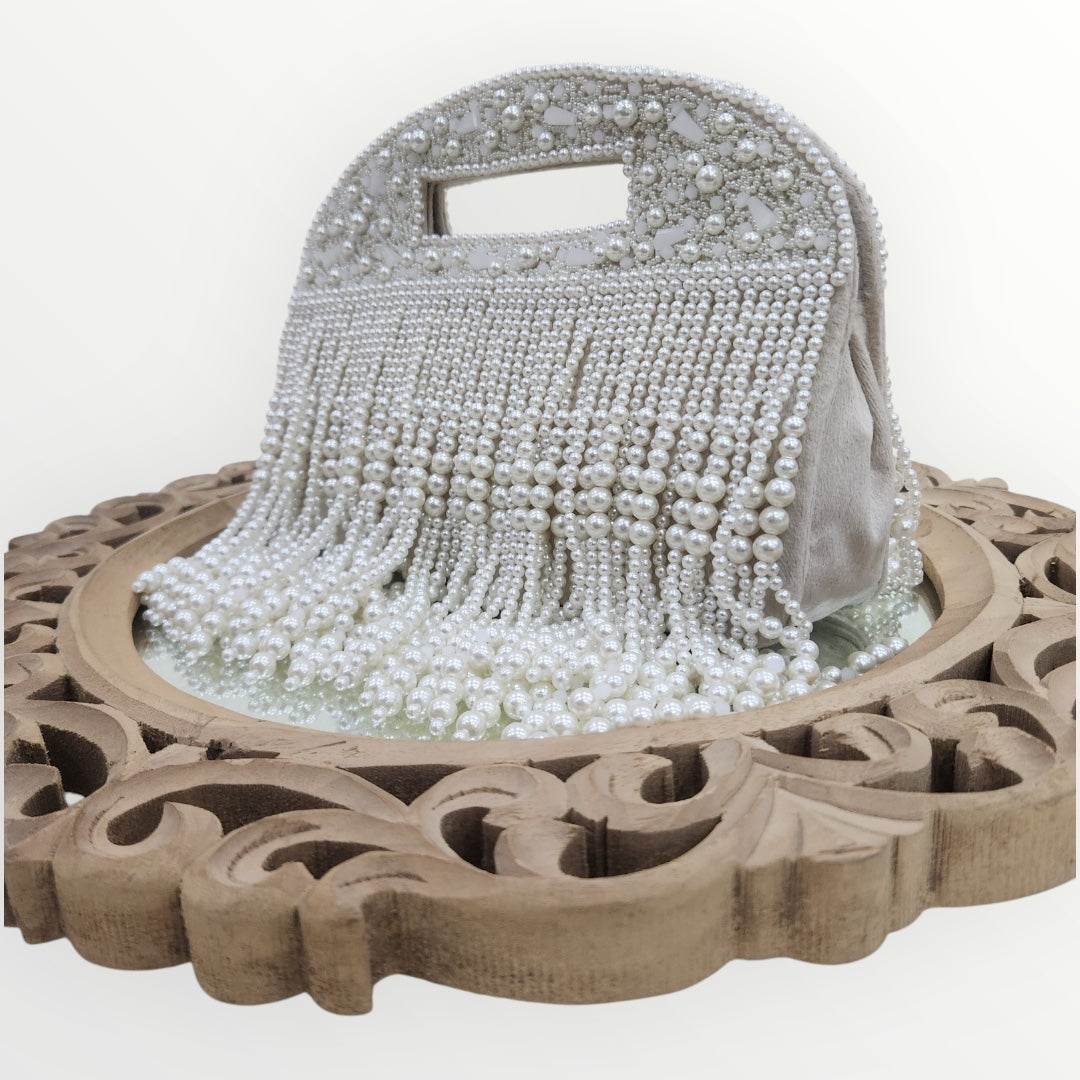 Chandrikaa Ivory Moti Clutch