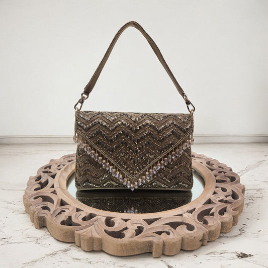 Swarnima Antique Gold Flapover Clutch