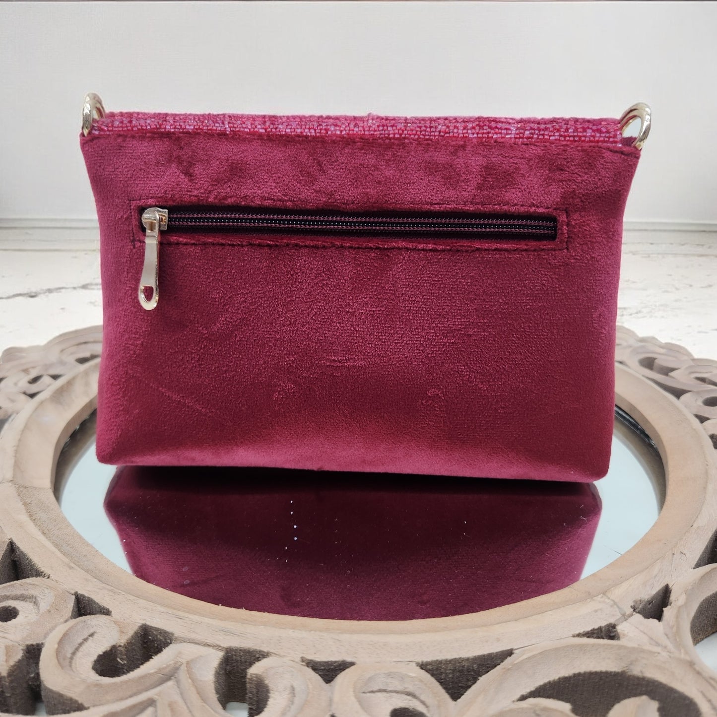 Swarnima Maroon Flapover Clutch