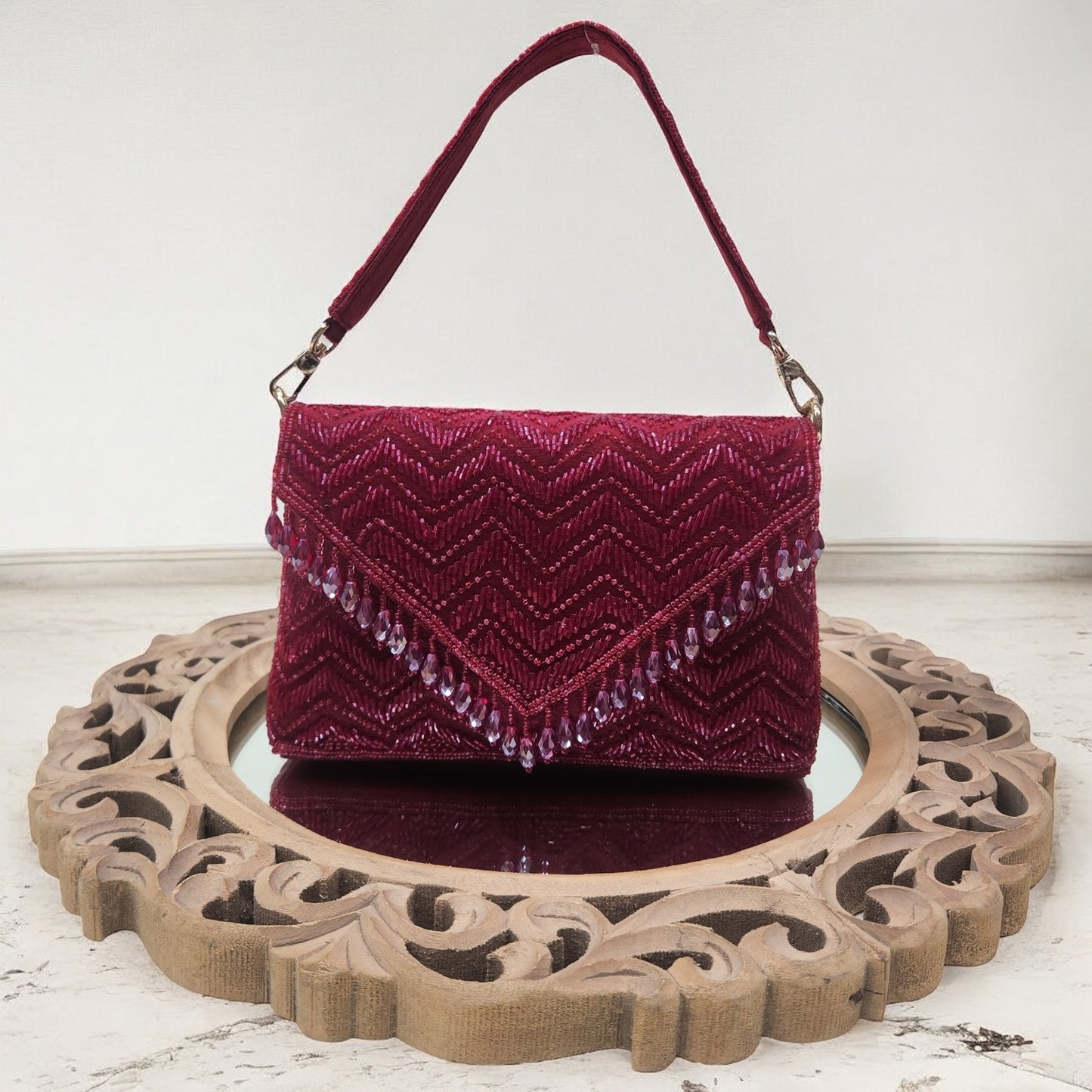 Swarnima Maroon Flapover Clutch