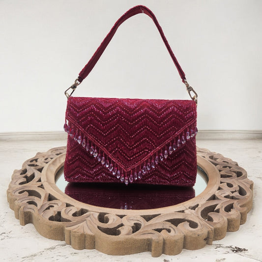 Swarnima Maroon Flapover Clutch