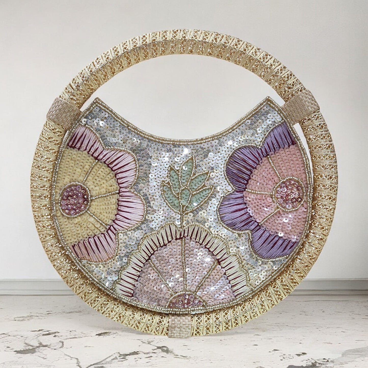 Varnika Gold Ring Bag