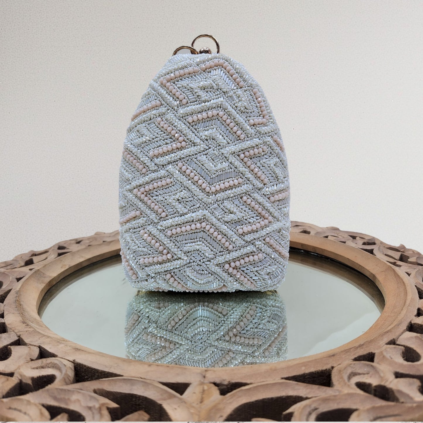Ira Cream Bottle Box Clutch