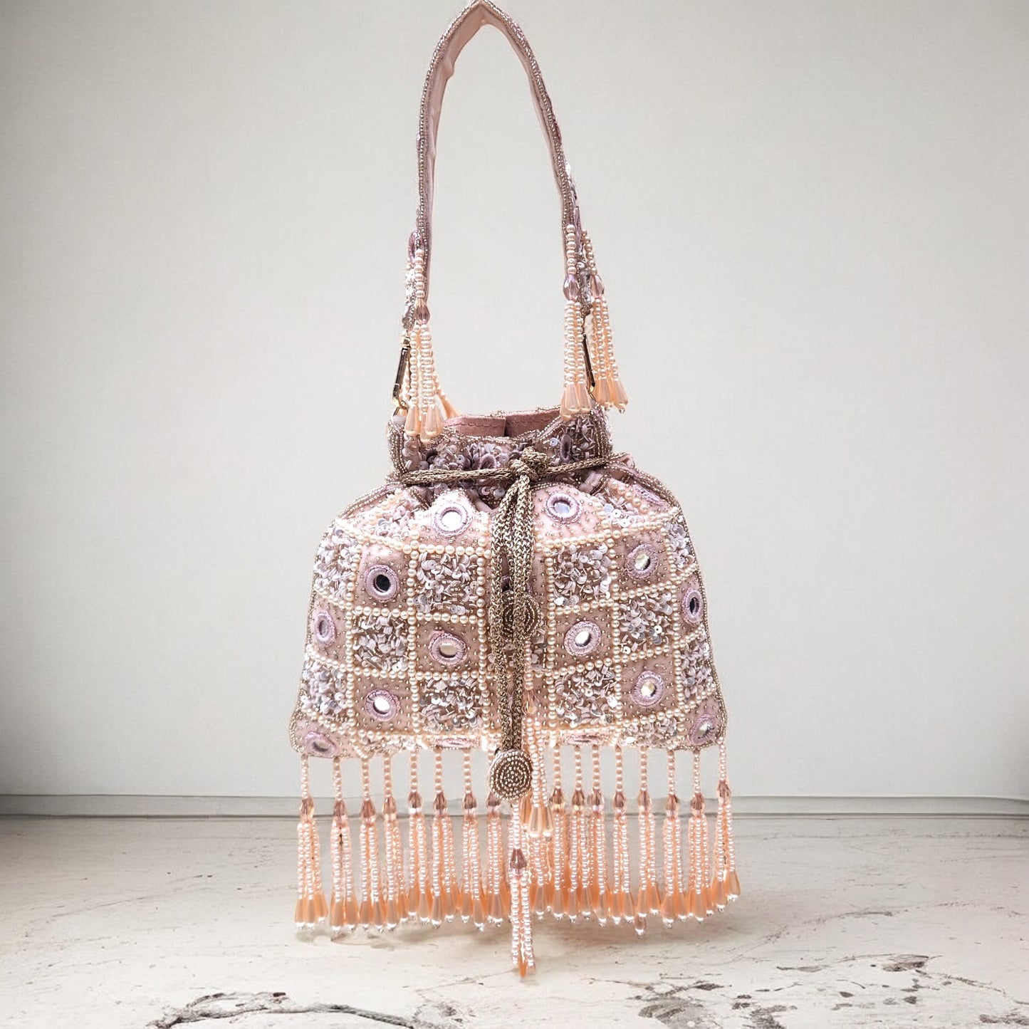Rajwada Sheesh Rose Gold Potli